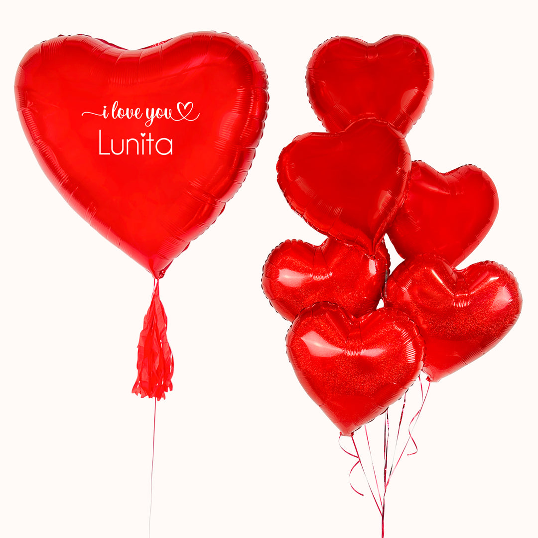 Bouquet de globos con helio para enamorar en San Valentín, corazón rojo grande personalizado y 6 globos metálicos en forma de corazón medianos, todo inflado con helio.