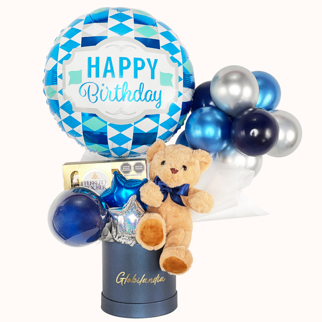 Gift box de cumpleaños en tonos azules, ideal para hombre, que incluye 1 peluche de osito mediano, 1 globo metálico de happy birthday, 1 caja de Ferrero Rocher (8 unidades), globitos decorativos y caja de regalo deluxe satinada, perfecto para sorprender en una ocasión especial.
