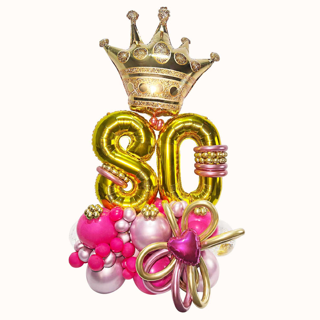 Mural de globos para cumpleaños o aniversario que incluye 2 globos metálicos de número medianos, 1 globo corona grande y base de globos de látex.