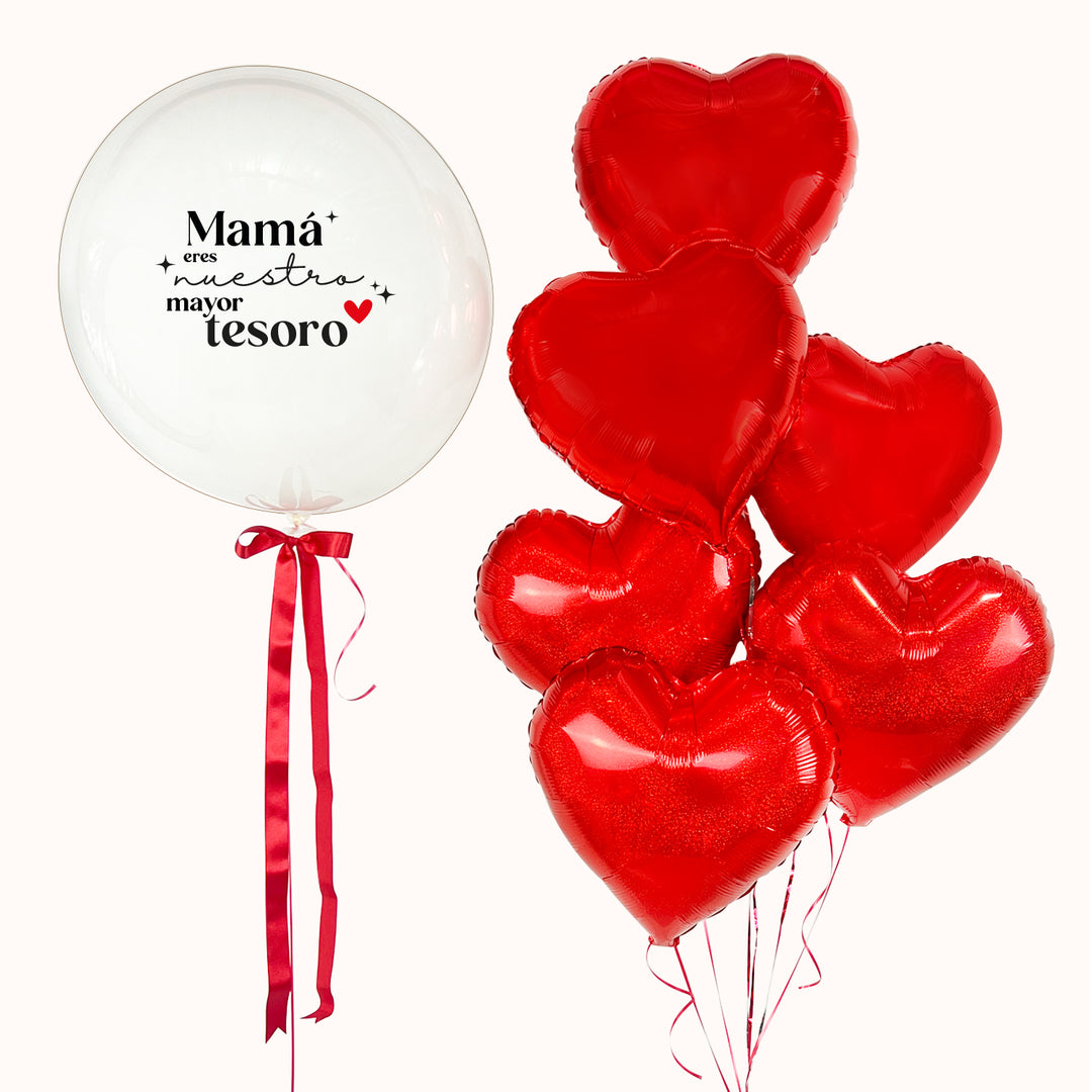 Arreglo de globos compuesto por 1 globo burbuja transparente personalizado, acompañado de 6 globos metálicos en forma de corazón color rojo. Para sorprender a mamá en su día.