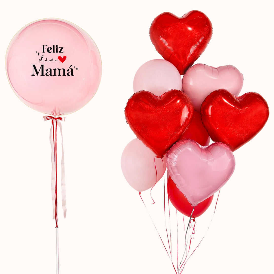 Bouquet de globos en tonos rojos y rosados. Incluye 1 globo burbuja con globo interno personalizado, acompañado de 4 globos látex y 5 globos metálicos en forma de corazón. Para celebrar a mamá en su día.