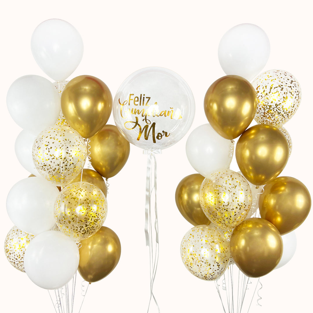Arreglo de globos con helio que incluye 1 globo burbuja con confetti personalizado , 20 globos de látex en color sólido, 10 globos de látex transparentes con confetti y 3 pesas para una presentación segura y elegante. Ideal para cumpleaños, aniversarios, celebraciones especiales y eventos corporativos.