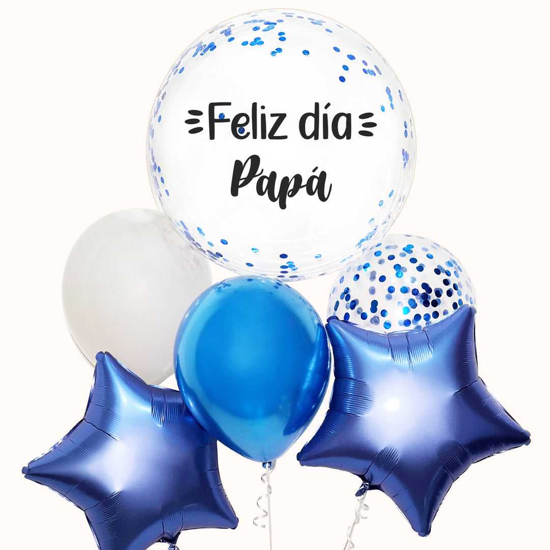 Globos con helio personalizados para sorprender a tu padre en su día especial. Incluye una burbuja transparente personalizada con la frase “Feliz Día Papá”, 2 globos estrella metálicos, 2 globos látex y 1 globo látex con confeti en su interior.