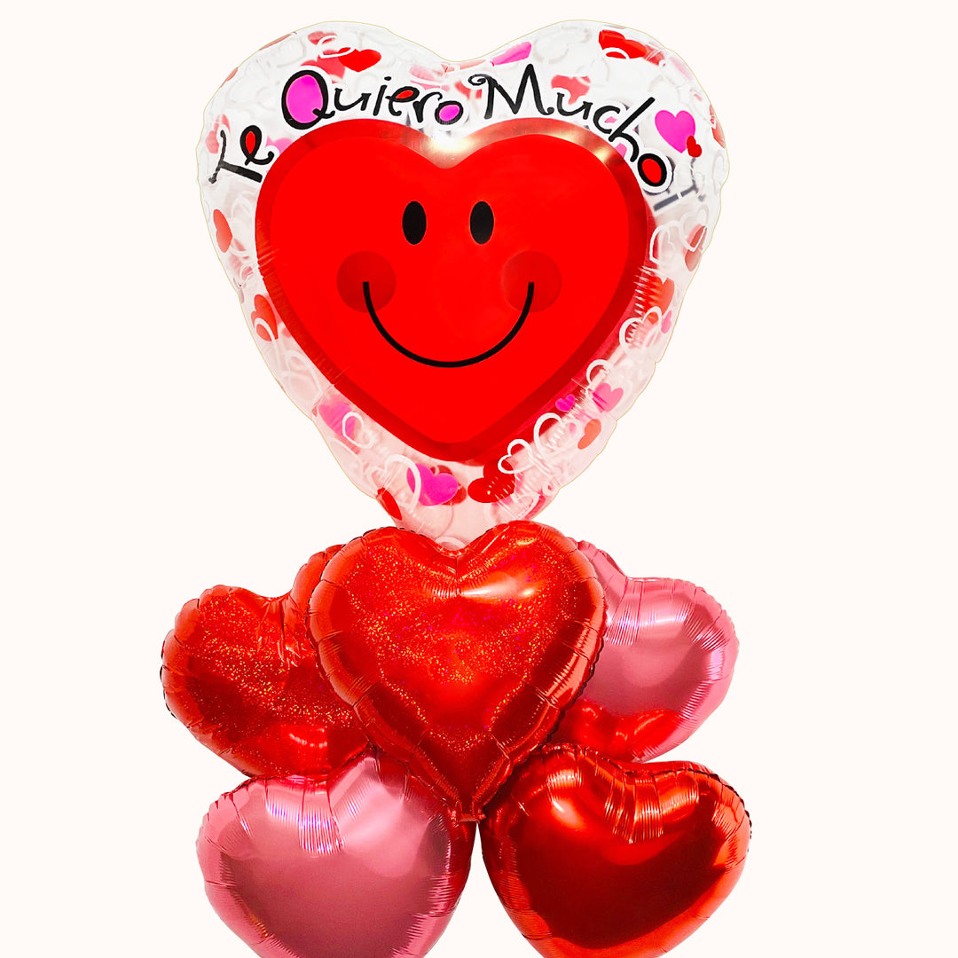 Arreglo de globos metálicos para pareja: Bouquet de globos metálicos en forma de corazón, con globo principal con mensaje 'Te quiero mucho' con carita feliz, acompañado de 3 globos en forma de corazón color rojo y 2 en color rosado. Regalo para San Valentín, Día del Amor y la Amistad.