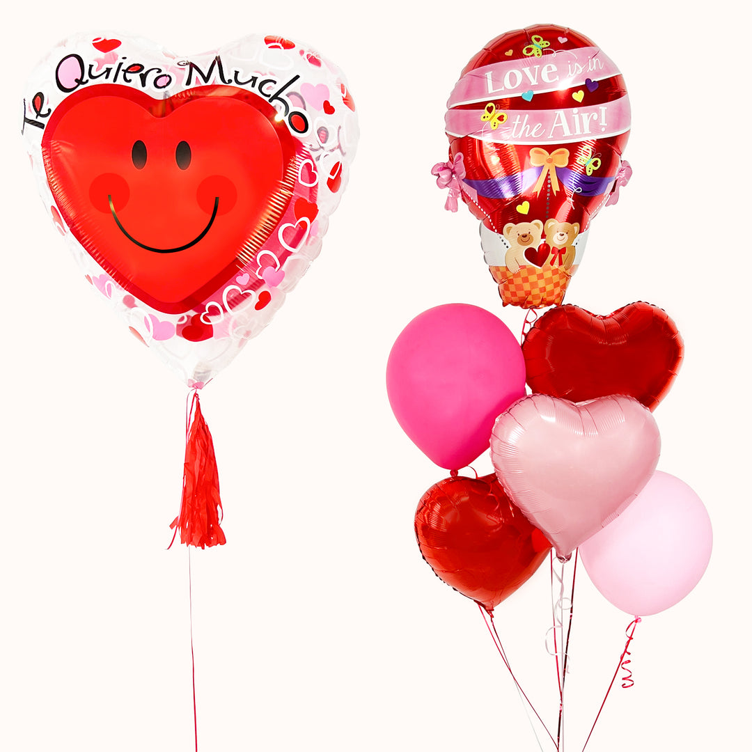 Ramo de globos “Te Quiero Mucho”, compuesto por 1 globo metálico de corazón carita feliz  y 1 bouquet de 2 globos látex, 3 globos metálicos de corazón y 1 globo aerostático con ositos. Para festejar el día del amor y la amistad. Celebra tu aniversario de amor.