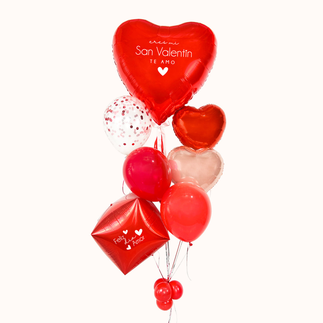Arreglo de globos con helio para  “San Valentín”. 1 globo metálico corazón grande, 2 globos metálicos en forma de corazón, 1 cubo rojo personalizado, 2 globos látex y 1 globo látex con confeti. Un arreglo de globos para sorprender en San Valentín o en cualquier ocasión especial. Especial para festejar el Día del Amor. 