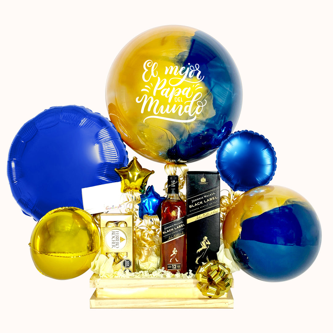 El detalle perfecto para papá: un regalo especial que incluye whisky Johnnie Walker Black Label, una caja de chocolates Ferrero Rocher de 8 unidades y un vaso. Acompañado de un globo burbuja pintado y personalizado con la frase “Feliz Día, Papi”, además de diversos globos decorativos para desearle muchas felicidades en su día.
