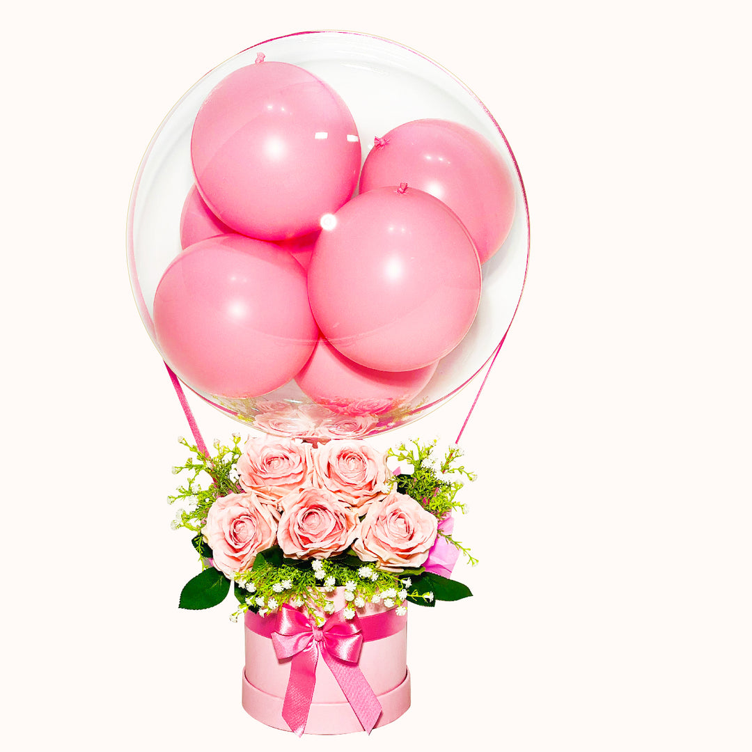 Gift box que incluye rosas decorativas artificiales, caja de regalo redonda y 1 globo burbuja personalizado con globitos en su interior. Para regalo de cumpleaños o cualquier ocasión especial.