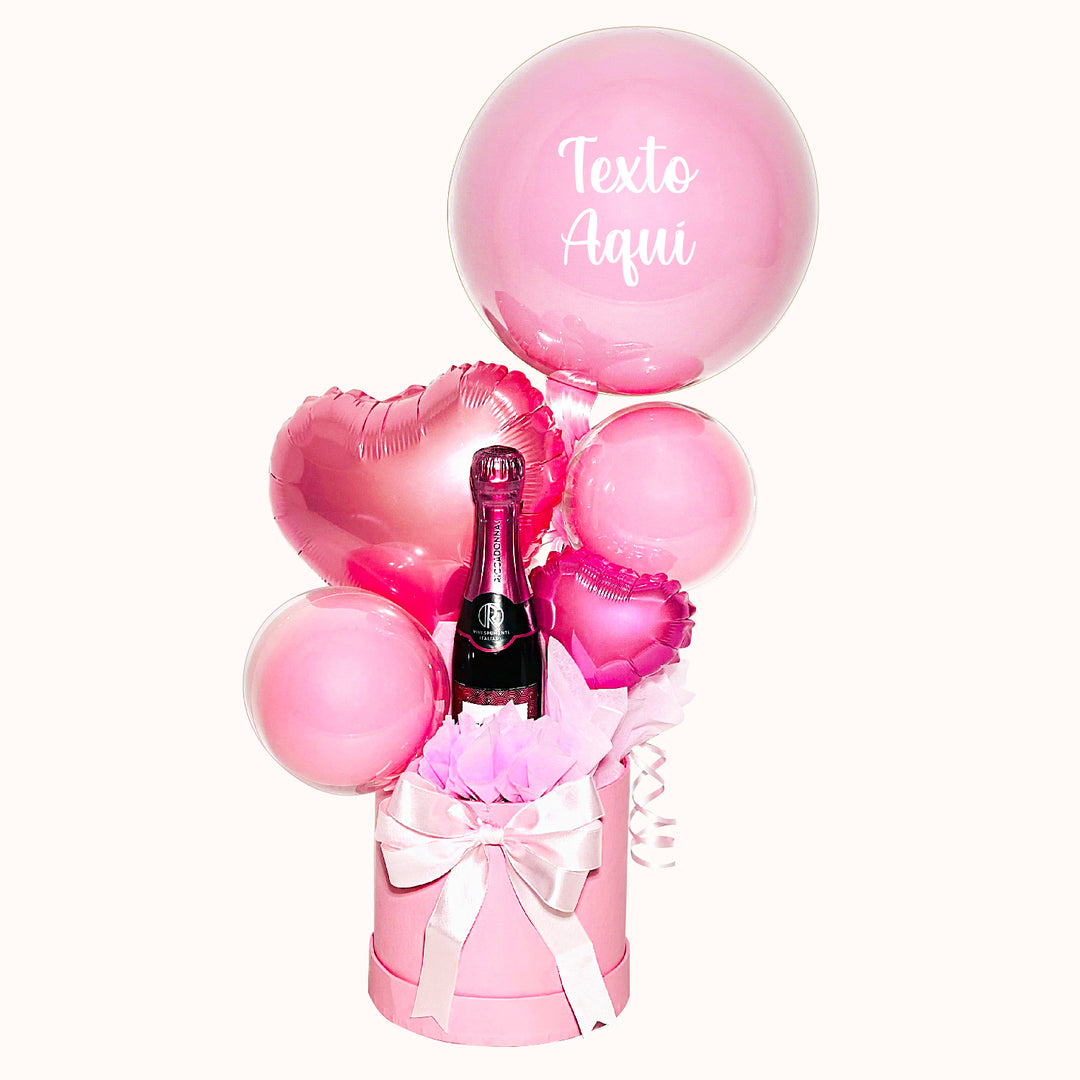 Gift box en caja redonda decorativa que incluye 1 globo burbuja personalizable, 1 botella Riccadonna Ruby de 200 ml y globitos decorativos pequeños. Para regalar en cumpleaños o cualquier ocasión especial.
