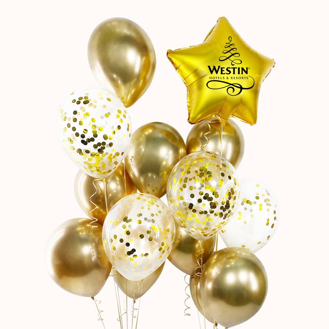 Dúo bouquet de globos de látex y globos transparentes con confeti, acompañado de estrella personalizada. Ideal para decorar eventos corporativos de temporada en elegantes tonos dorados.
