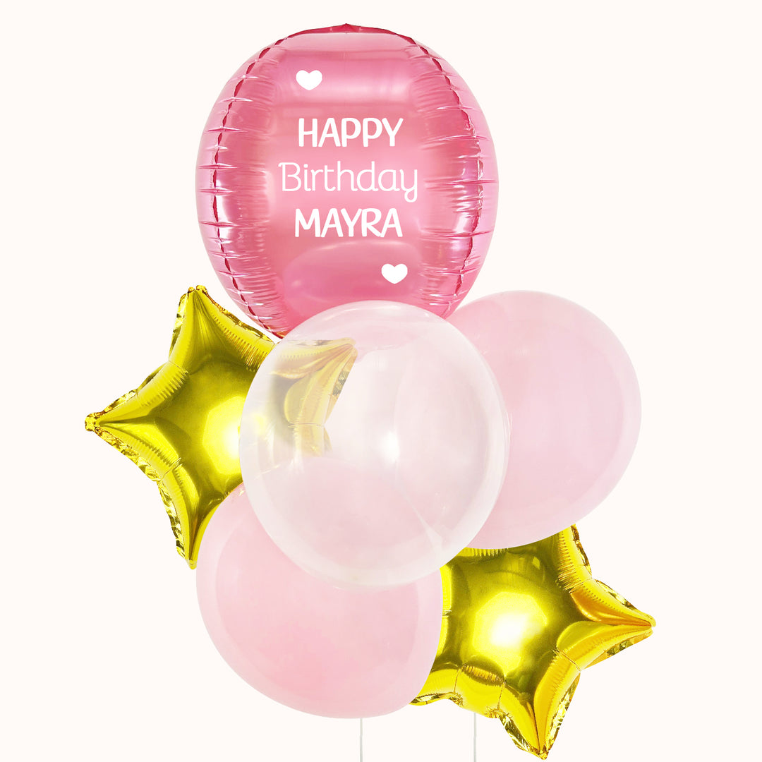 Bouquet de globos con helio para cumpleaños que incluye 1 globo esfera rosado personalizado, 2 globos metálicos en forma de estrella dorados y 3 globos de látex transparente en tono rosado pastel, ideal para celebrar de forma especial.