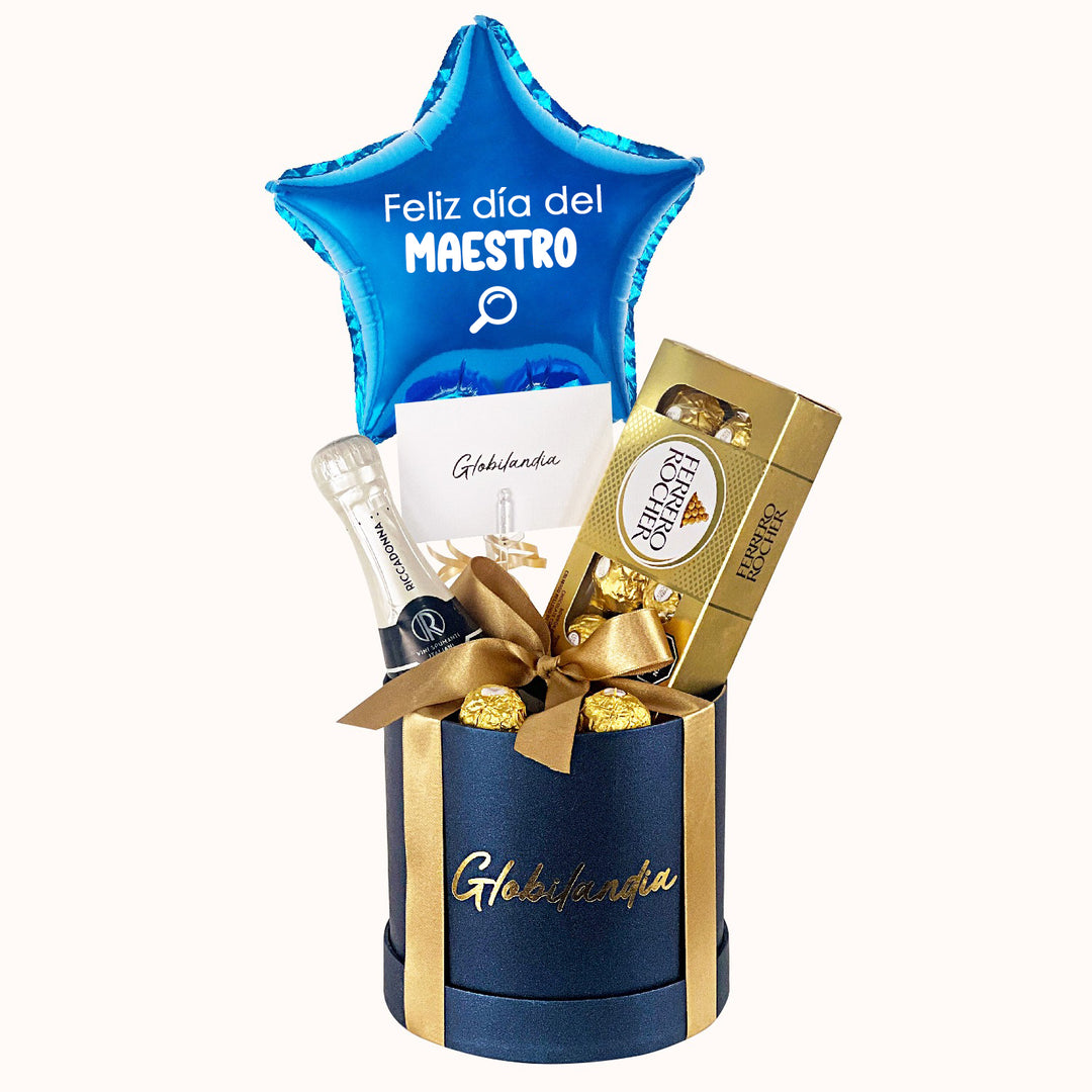 Gift Box, el regalo perfecto para el Día del Maestro. Incluye una hermosa caja circular con tapa, delicadamente decorada, que contiene un espumante Riccadonna de 250 ml, una caja de chocolates Ferrero Rocher y, adicionalmente, 3 Ferrero Rocher sueltos. y un globo estrella personalizado feliz día. Un detalle para tu profesor favorito