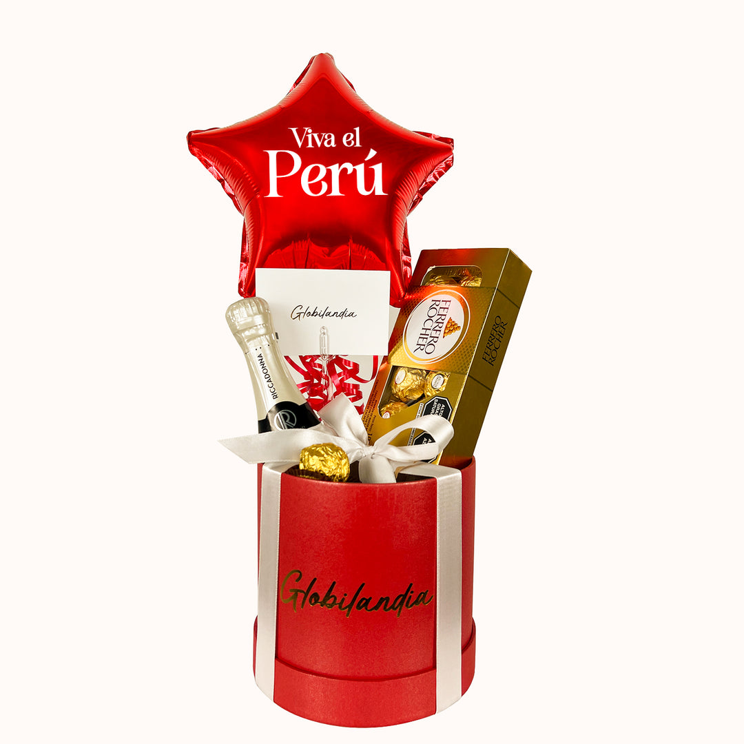 Gift box para regalar a tus clientes de manera corporativa, en tonos rojo y blanco, personalizado con la frase “Viva el Perú” y tu logo. Un detalle ideal para realzar tu marca. Incluye Riccadonna Asti de 200 ml y una caja de chocolates Ferrero Rocher de 8 unidades.