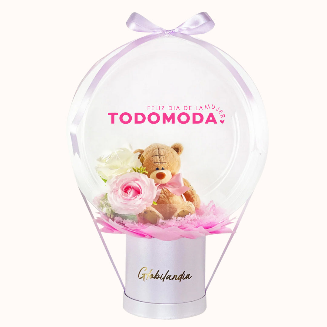 Gift box corporativo para la campaña del Día de la Mujer que incluye 1 globo burbuja con osito de peluche y flores en su interior, con opción de personalizar la burbuja con nombre, y caja de regalo pequeña, ideal para obsequios empresariales para clientes y colaboradores.