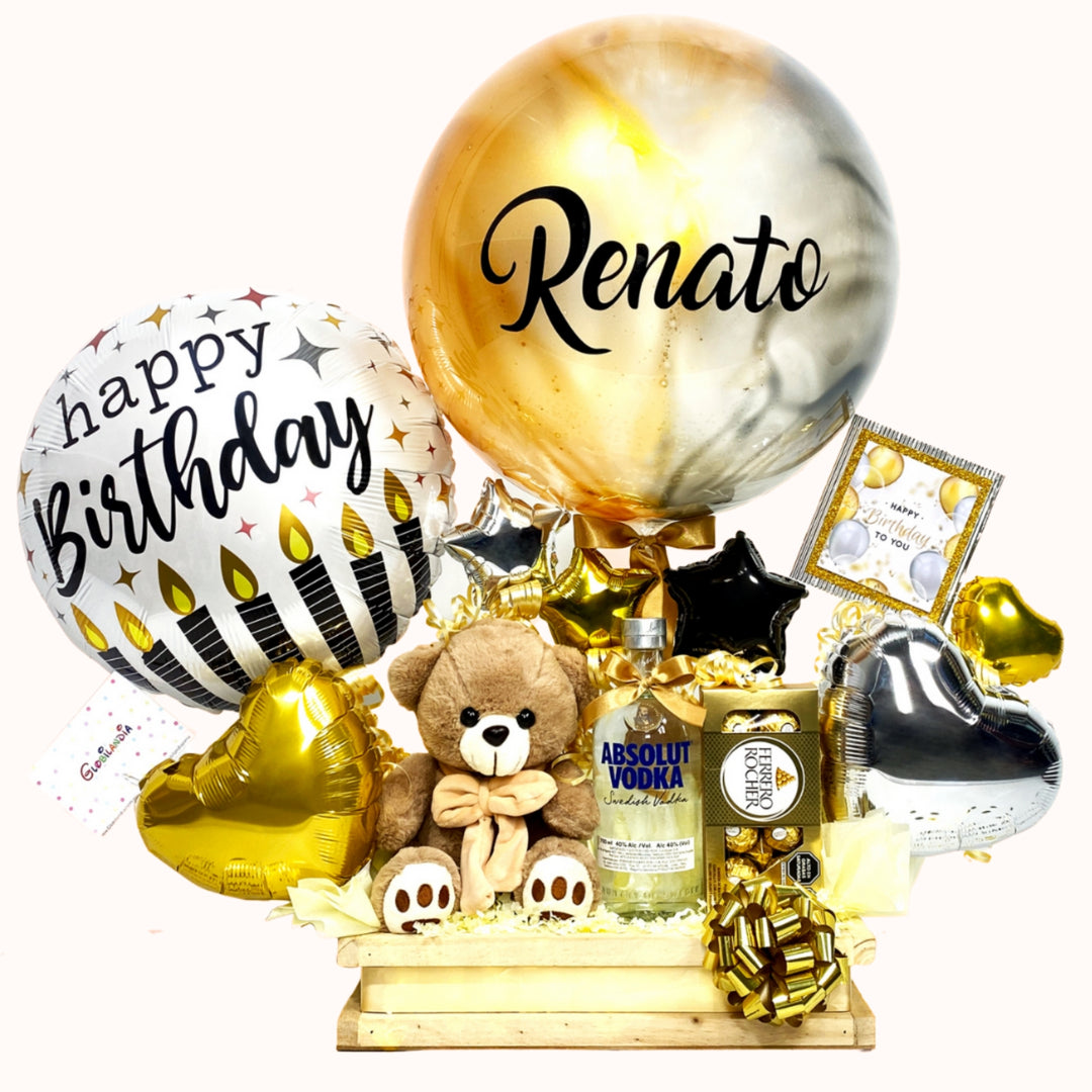 Gift box con: globo burbuja pintado y personalizado,  globo “Happy Birthday”, botella de vodka Absolut de 700 ml, peluche pequeño de osito, caja de Ferrero Rocher de 8 unidades y globitos decorativos pequeños. Un regalo ideal para sorprender y celebrar