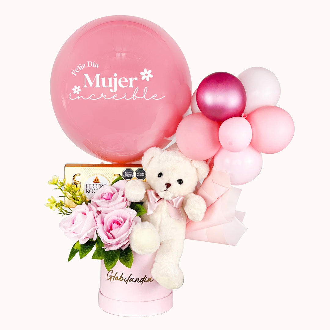 Arreglo para el Día de la Mujer que incluye 1 peluche de osito mediano, 1 globo burbuja personalizable, 1 caja de Ferrero Rocher (8 unidades), globitos decorativos y caja de regalo deluxe satinada, ideal para obsequios en esta fecha especial.