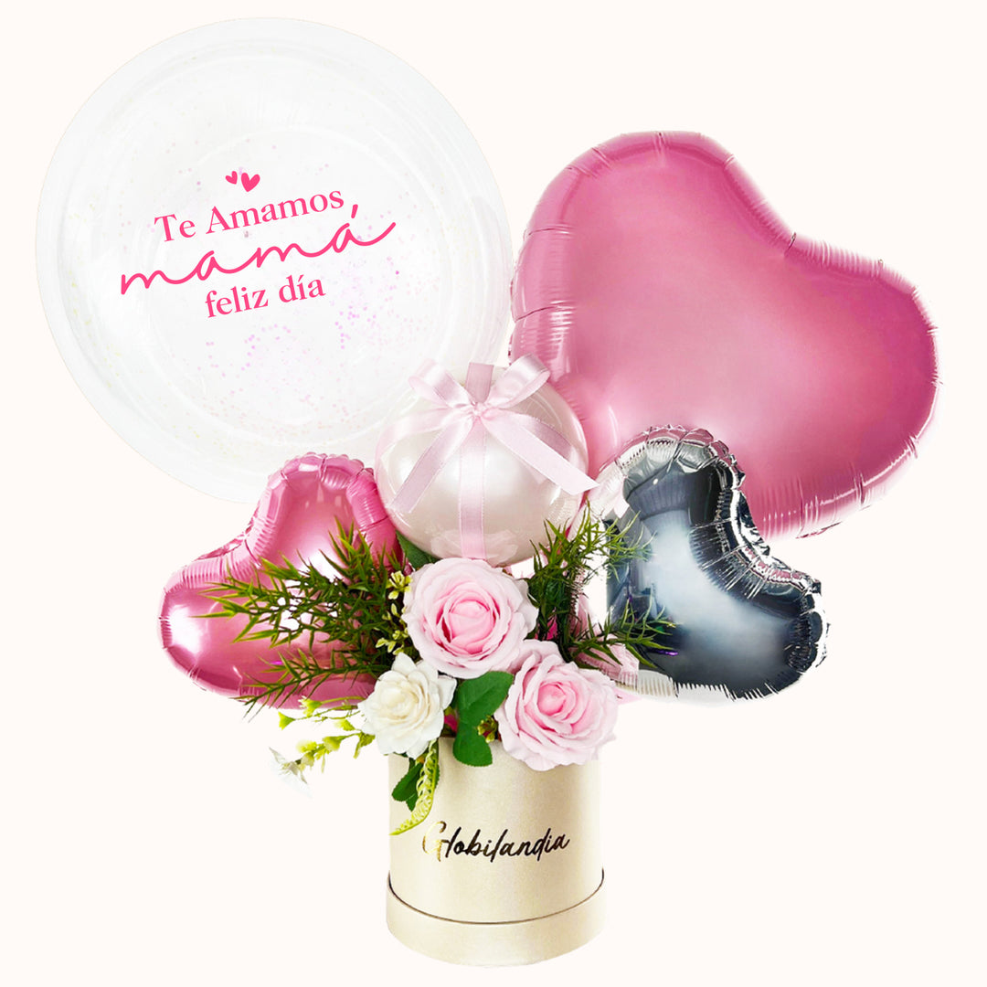 Arreglo para el Día de la Madre con globo burbuja transparente personalizable, rosas artificiales decorativas, globitos pequeños y caja de regalo satinada. Ideal sorprender a mamá.