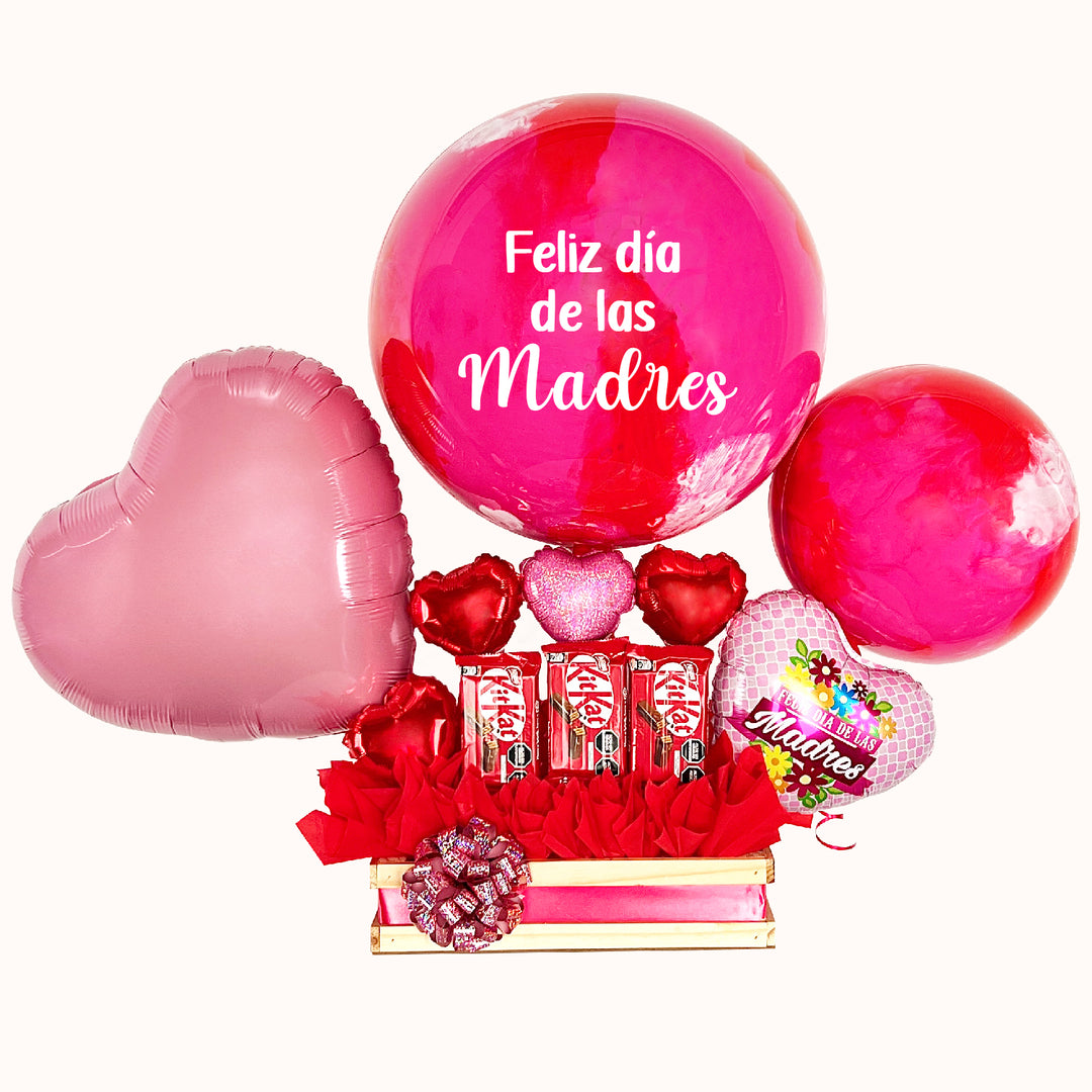 Caja de regalo grande para el Día de la Madre con globo burbuja pintado y personalizado, globo corazón, globo burbuja pequeño pintado, 3 chocolates Kit Kat y globitos decorativos pequeños. Ideal para sorprender a mamá en su día.
