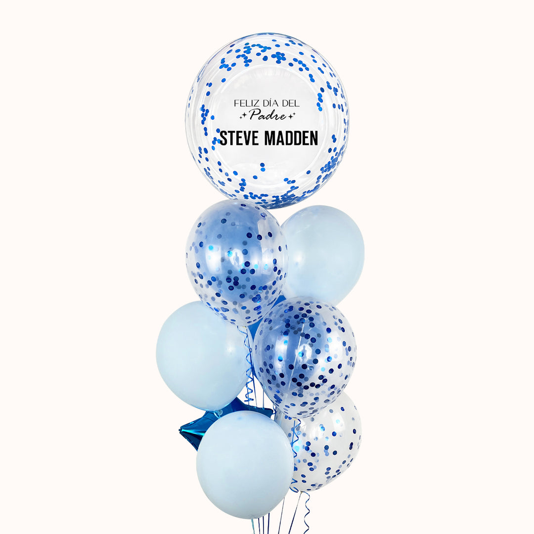Arreglo corporativo con globos con helio y globo burbuja personalizado para el Día del Padre. Incluye 1 globo burbuja con confetti personalizado, 2 estrellas metálicas, 4 globos de látex, 3 globos de látex con confetti y 1 pesa decorativa; una excelente opción para decorar sorprender y celebrar esta fecha especial. 