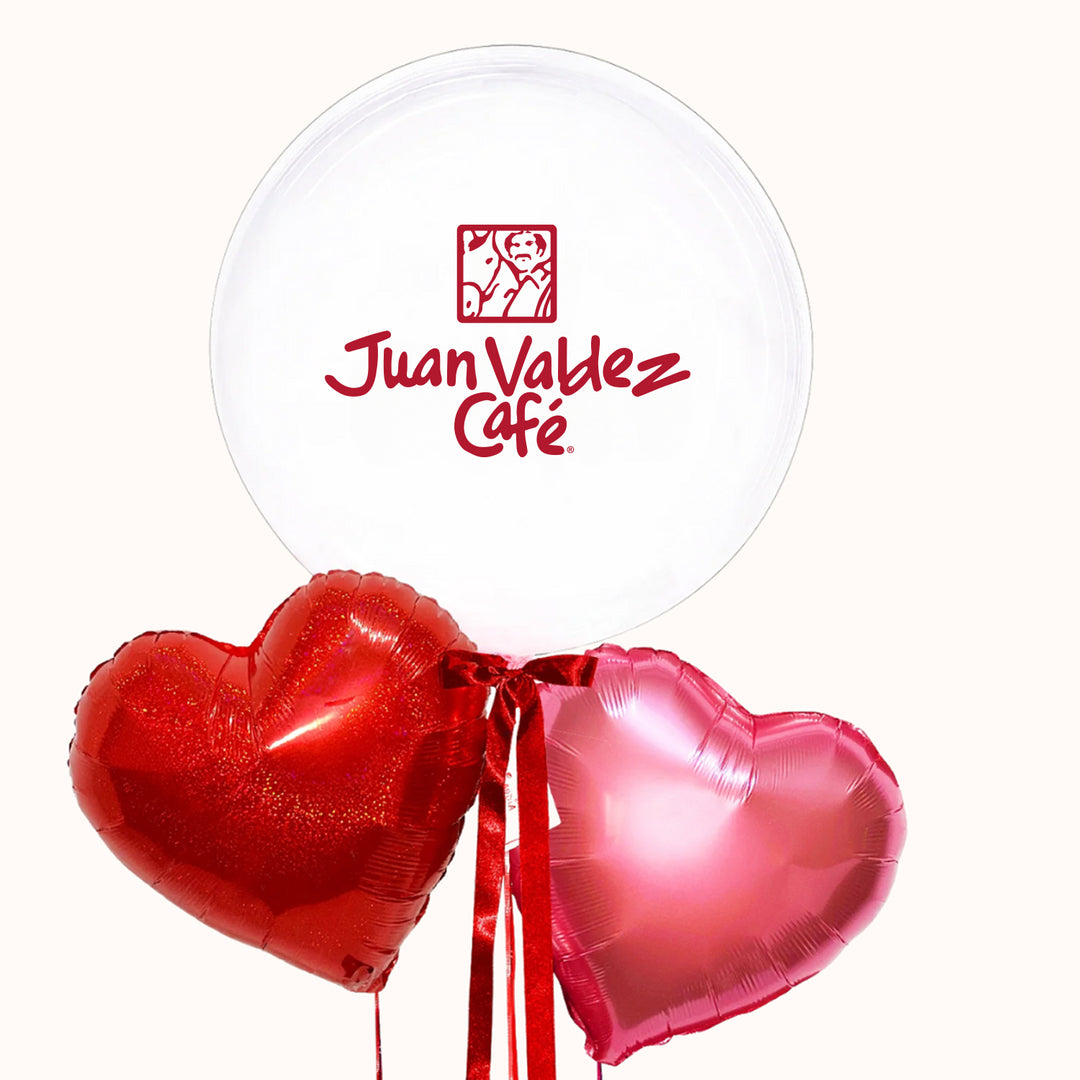 Arreglo corporativo de globos: Bouquet de globos corporativos con helio 1 globo burbuja transparente personalizado con tu logo, 2 globos metálicos en forma de corazón en tonos rojo y rosado. Para campaña de San Valentín.