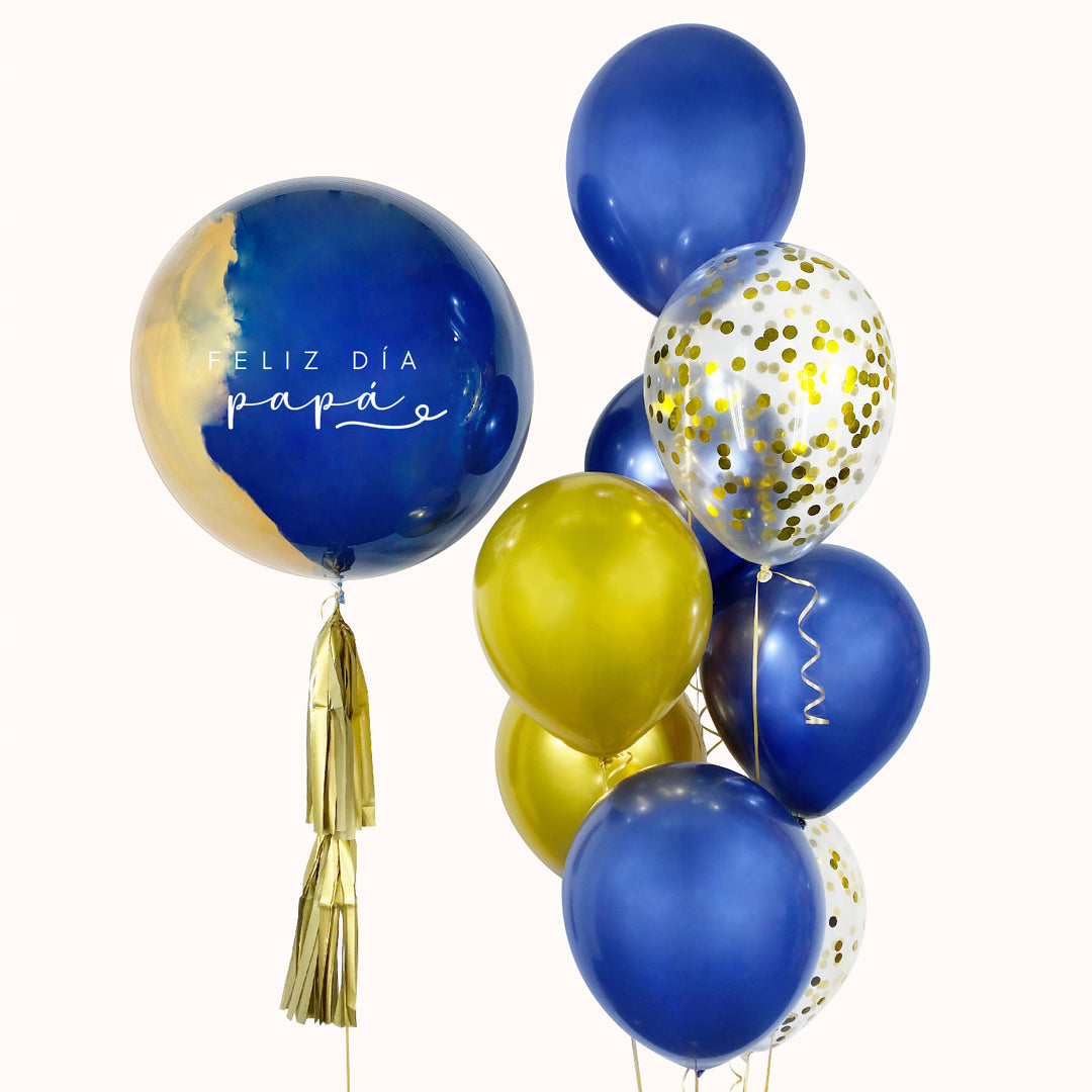 Día del Padre. Arreglo con helio que incluye 1 globo burbuja pintado personalizado (62 cms aprox.), 6 globos de látex en color sólido, 2 globos de látex confetti transparentes y 2 pesas decorativas; ideal para sorprender y celebrar a papá en su día especial.