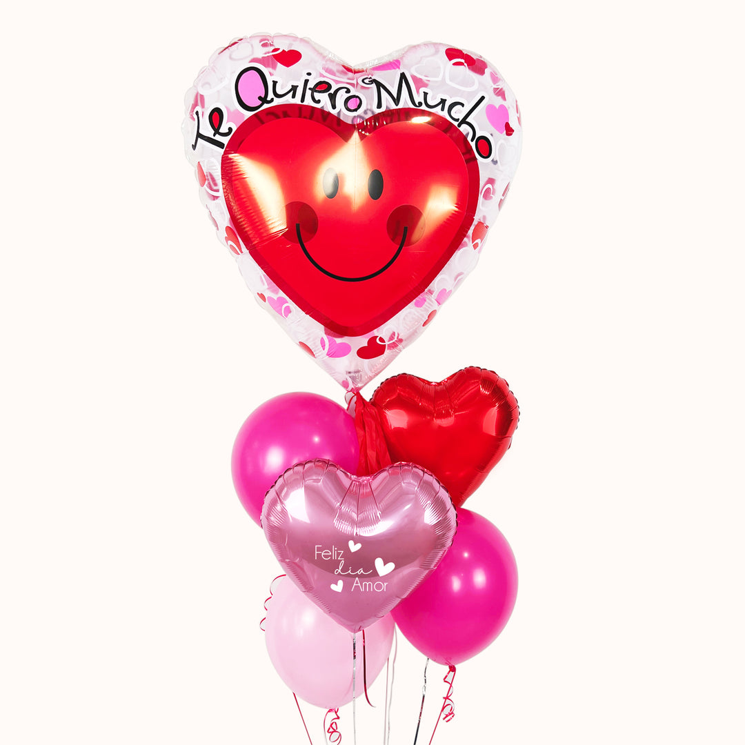 Bouquet de globos metálicos y látex en tonos rosado, fucsia y rojo, con un diseño alegre y lleno de amor, ideal regalar en San valentín.