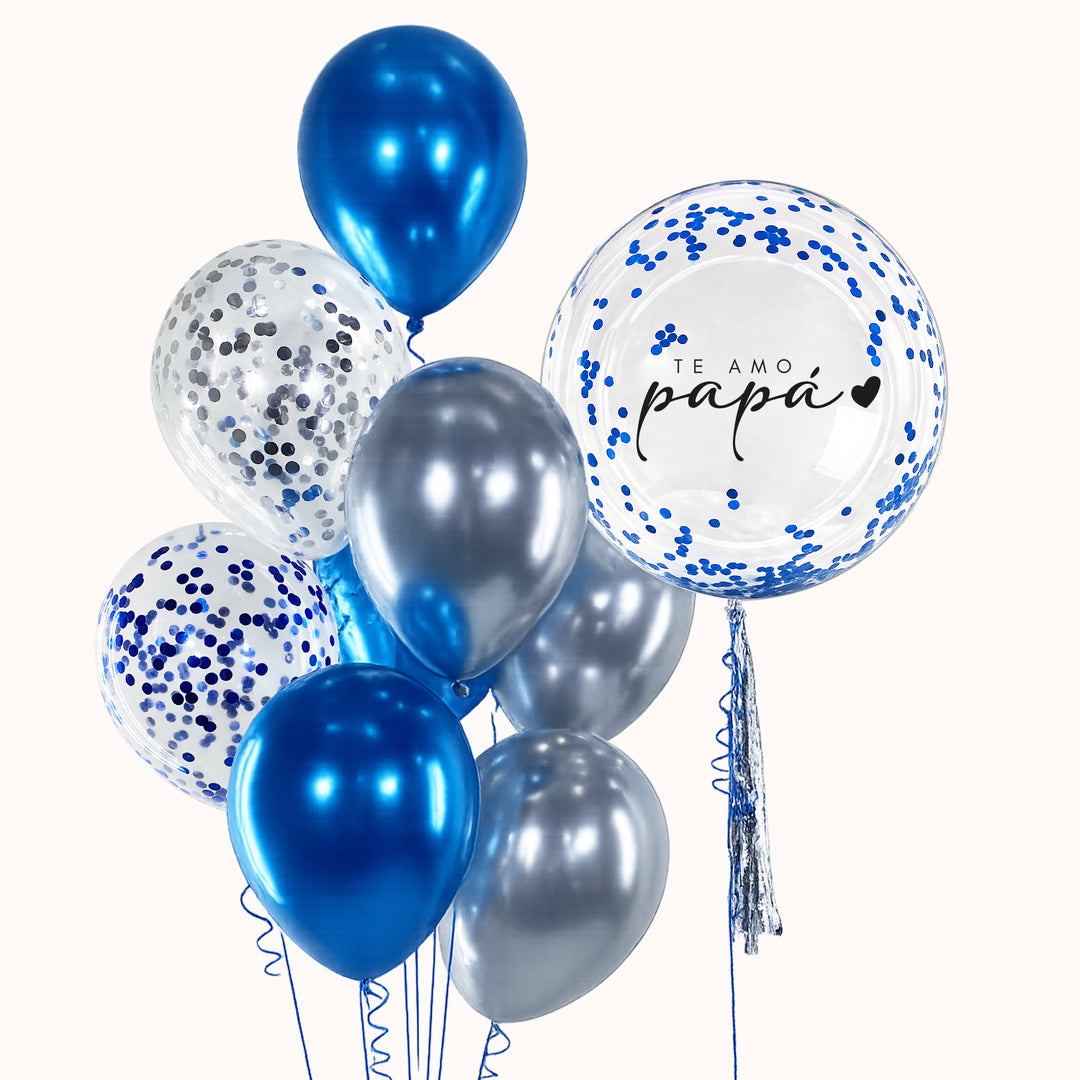 Día del Padre. Arreglo con helio que incluye 1 globo burbuja con confetti personalizado, 6 globos de látex en color sólido, 2 globos de látex con confetti y 2 pesas decorativas; ideal para sorprender y celebrar a papá en su día especial.