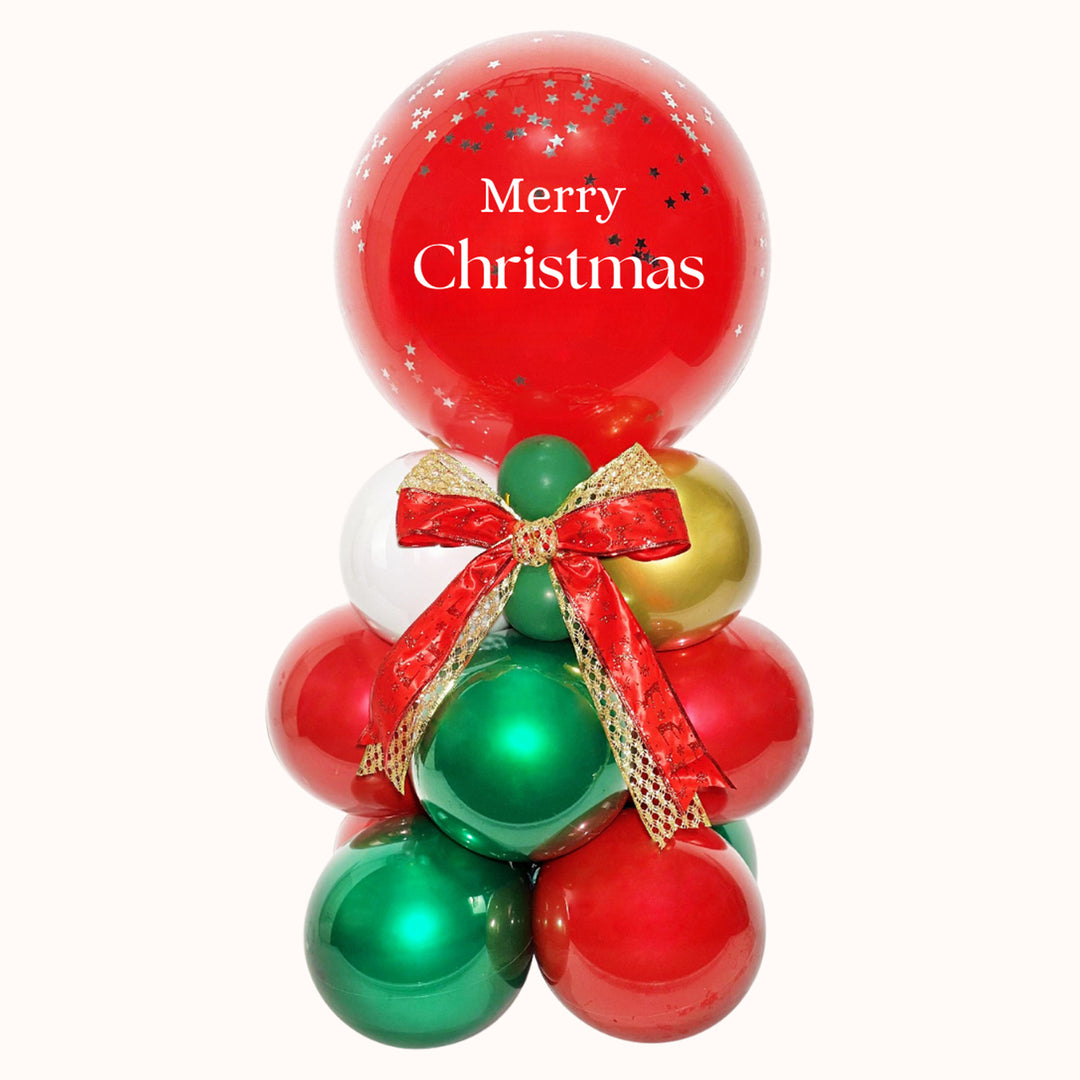 Mural de globos con globo burbuja y globo interno, personalizado con la frase “Merry Christmas”. Celebra la Navidad y decora tus eventos corporativos resaltando tu marca con estilo.
