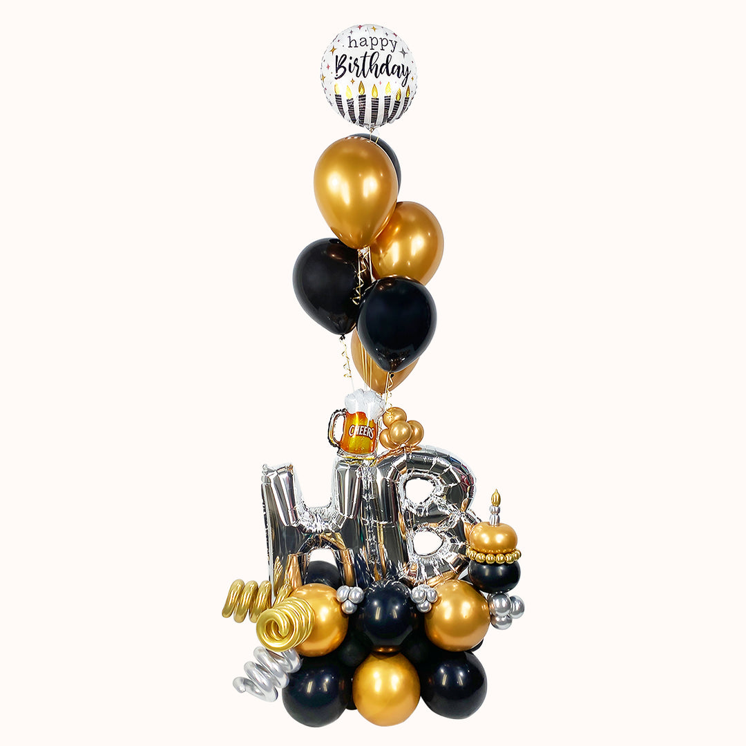Mural de globos que incluye: 2 globos de letras “HB” en color plateado medianos, globitos decorativos pequeños, base de globos de látex, 6 globos de látex en color sólido con helio y 1 globo Happy Birthday con helio. Ideal para cumpleaños.