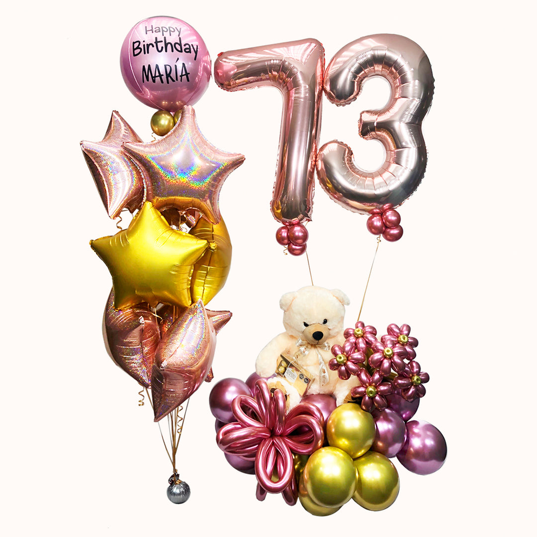 Mural y ramo de globos para cumpleaños o aniversario incluye: 1 ramo de flores de globos, 1 oso de peluche grande, 1 caja de Ferrero Rocher de 8 unidades, base de globos de látex, 1 globo metálico de número con helio grande, 9 globos estrella con helio y 1 globo esfera personalizado con helio. Ideal para celebrar ocasiones especiales.