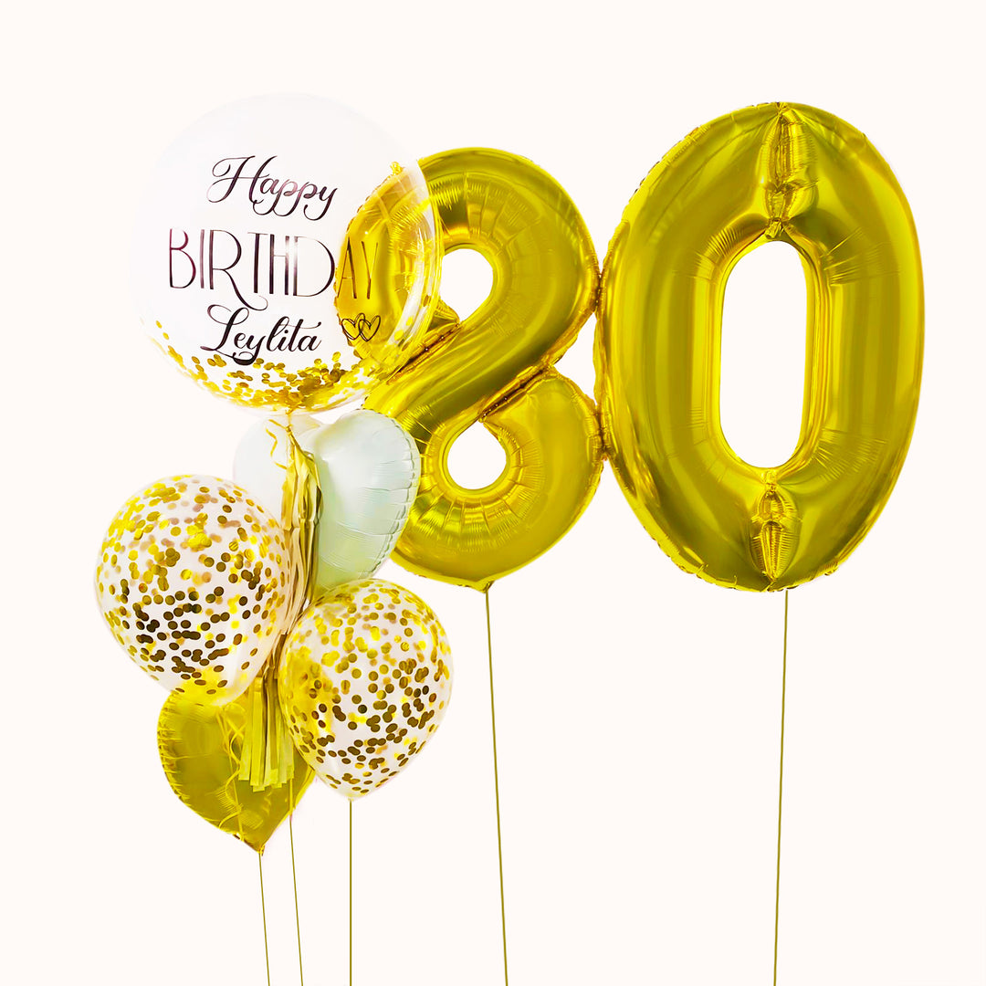 Bouquet de 7 globos con helio: 2 números grandes dorados, 1 burbuja 2 globos burbuja transparentes con escarcha 02 globos látex con confetti 2 globos corazón metálicos. Ideal para celebrar cumpleaños, aniversarios.