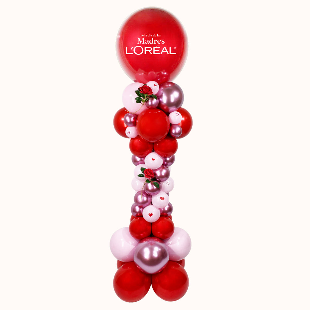 Parante de globos con estructura de 1.80 m para campaña corporativa del Día de la Madre, que incluye 1 globo burbuja con globo de látex en su interior personalizado, detalles con flores artificiales decorativas y base de globos de látex, ideal para decorar eventos empresariales y destacar tu marca.