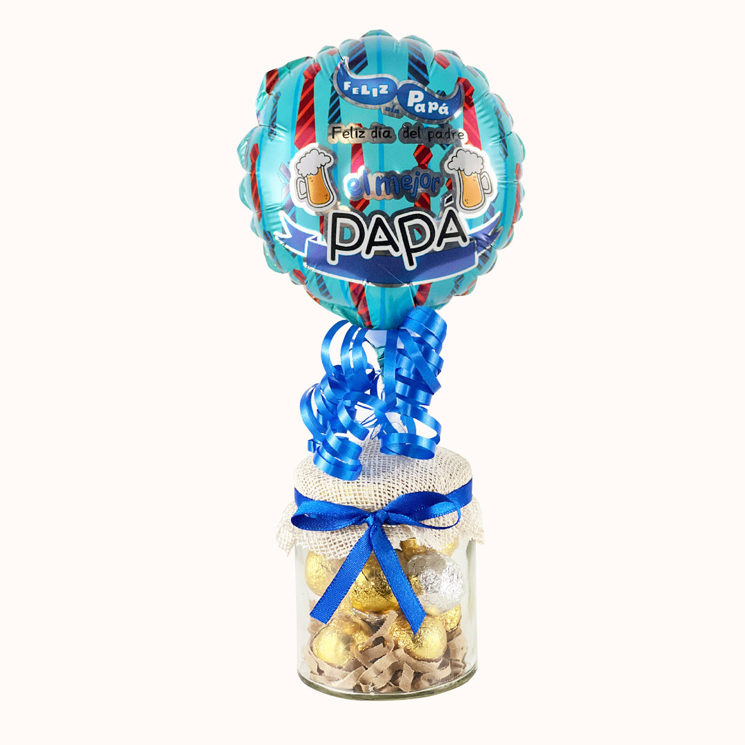 Pomo de vidrio relleno de mini chocolate, acompañado de globo personalizado día del padre, pomo personalizable con logo corporativo. Ideal como regalo del día del padre para colaboradores y clientes.