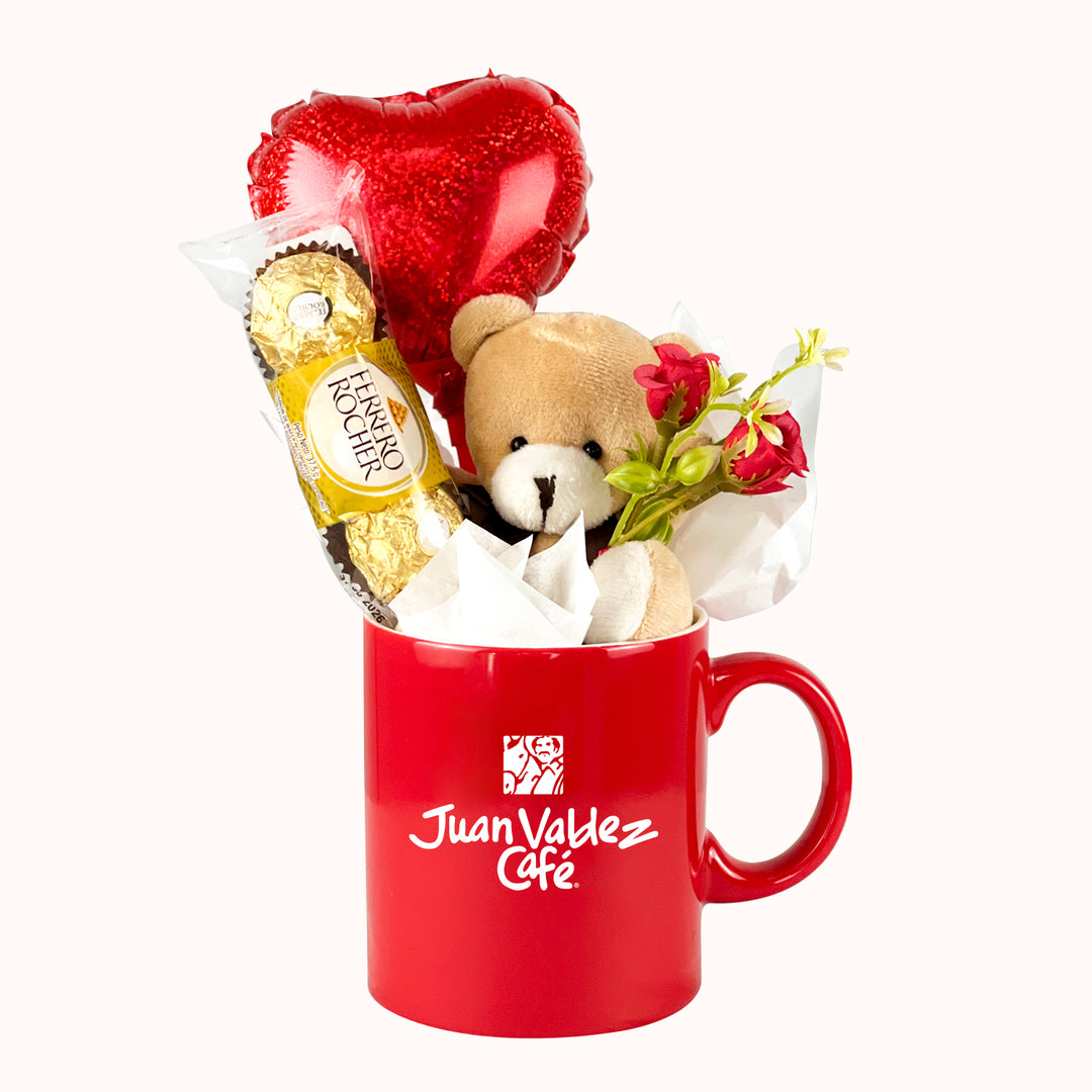 Detalle corporativo para San Valentín: taza personalizada con tu logotipo empresarial, decorada con chocolates ferrero rocher, osito y un globo de corazón. Para campaña de San Valentín, regalo a clientes y colaboradores.