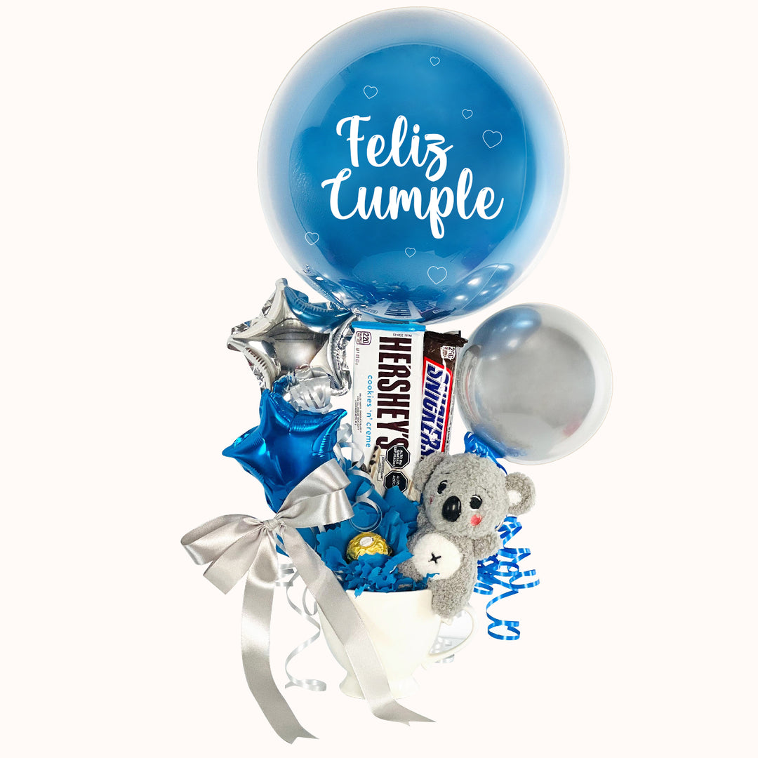 Arreglo en taza de cerámica para cumpleaños y distintas ocasiones, Incluye: 1 globo burbuja personalizado, 1 peluche de animalito , 2 chocolates importados, globitos decorativos pequeños.