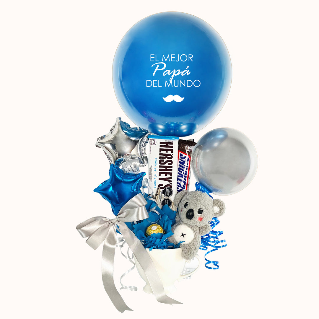 Arreglo en taza de cerámica para el día del padre y distintas ocasiones, Incluye: 1 globo burbuja personalizado, 1 peluche de animalito , 2 chocolates importados, globitos decorativos pequeños.