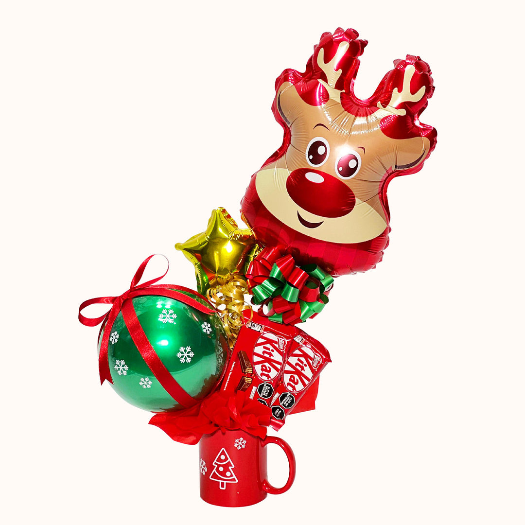 Taza navideña decorada con globos de temporada y dos chocolates importados. Un detalle ideal para sorprender a tus clientes y colaboradores en Navidad. Personalizable con el logo de tu empresa.