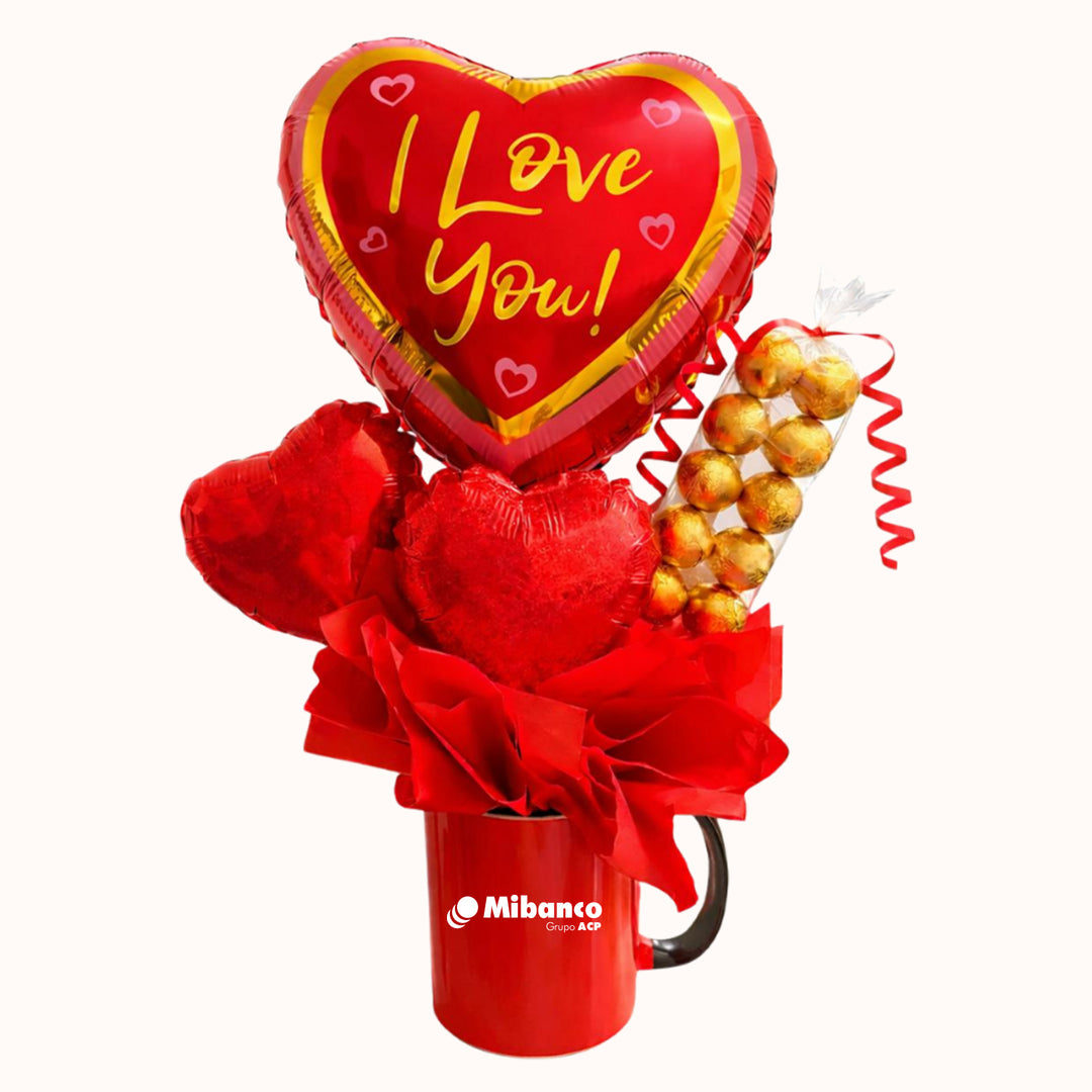Taza de regalo corporativo para la campaña de San Valentín, que incluye taza de cerámica, chocolates y globitos con el mensaje “I Love You”.  Para  clientes y colaboradores.